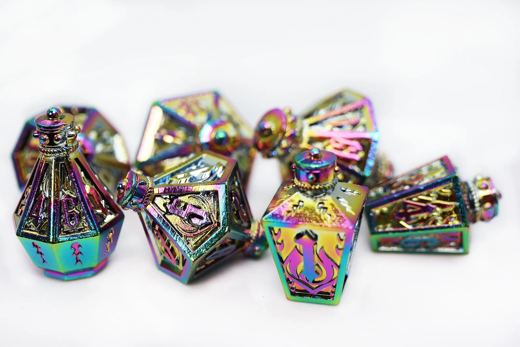 How to Choose a Metal Dice Set: Gold D6s vs Otzi D20 vs Prismatic Flames