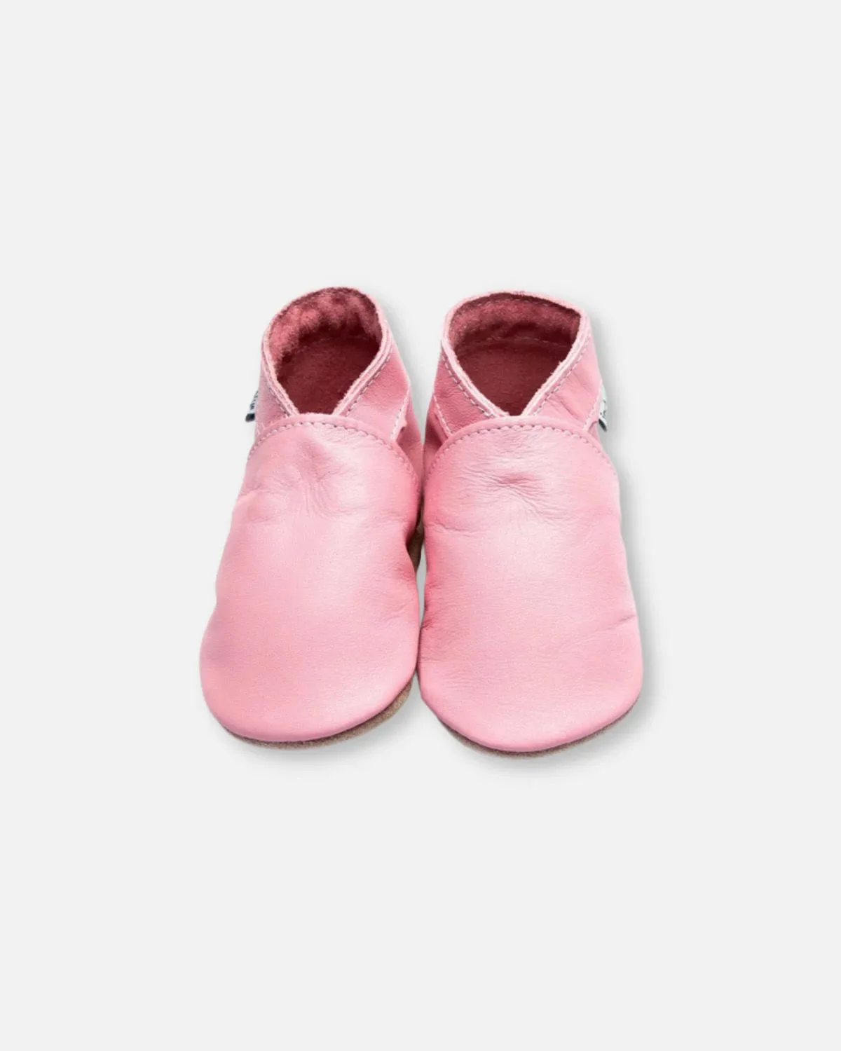 Chaussons en cuir rose uni