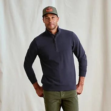 How to Choose the Right Hat for Rainy Fishing Days: Waxed vs. Water-Resistant