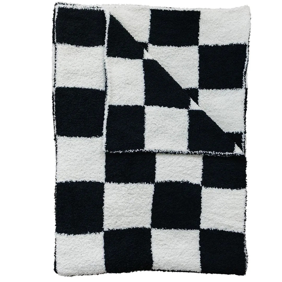 How to Keep a Checkered Plush Blanket from Shedding
