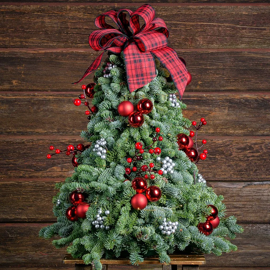Cómo decorar un árbol tartán para un look acogedor de cabaña