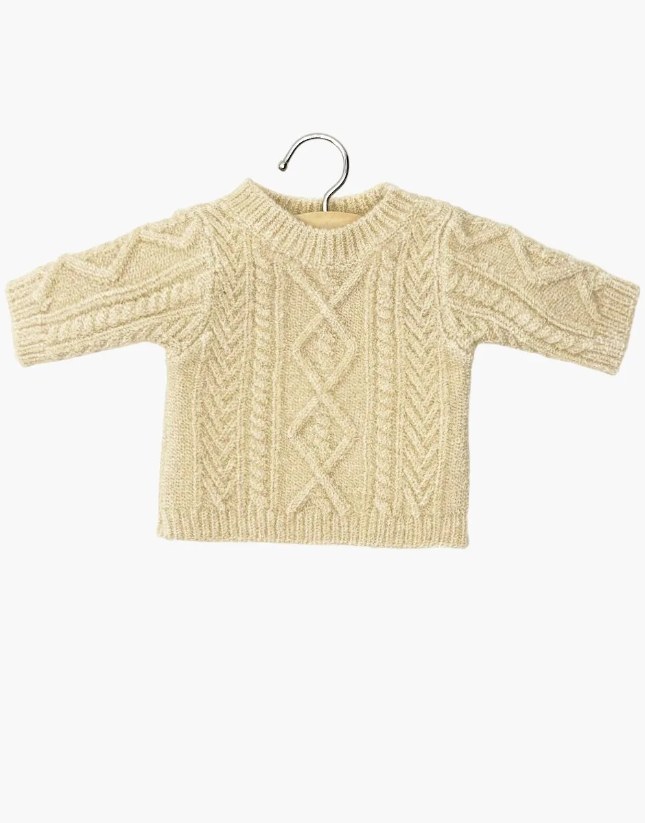 Comment ajuster un pull tricoté pour poupée avec torsades