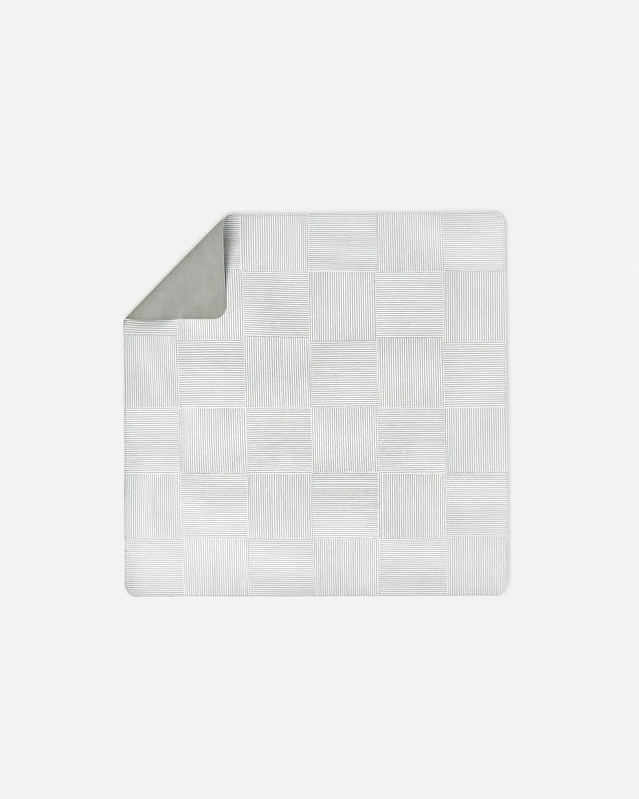 Splat Mat vs. Quilted Play Mat: Which Floor Protector?