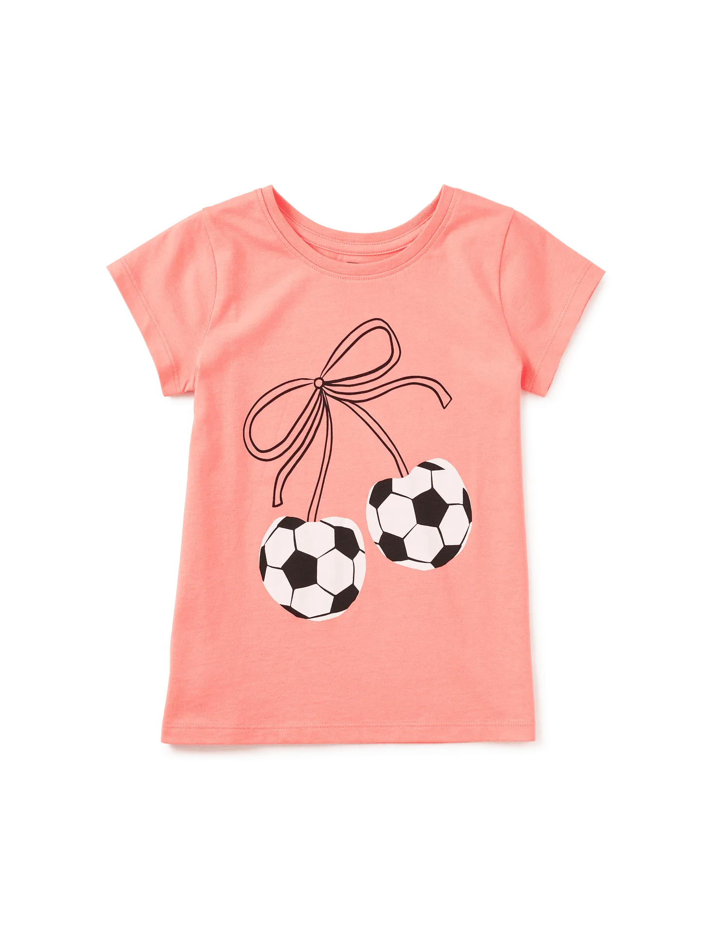 Cómo combinar una camiseta gráfica de fútbol para niñas