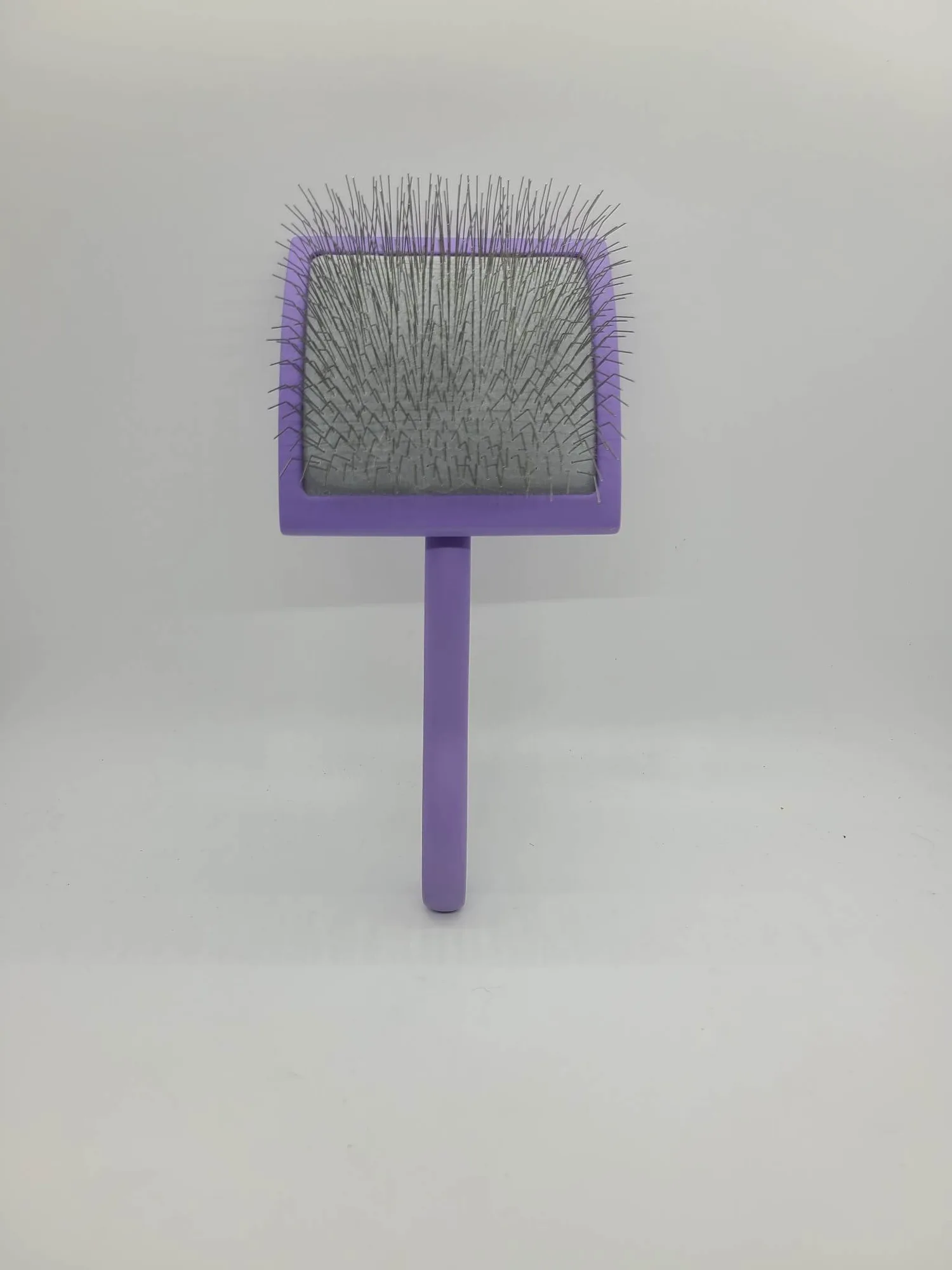 ชุดแปรง Slicker Brush: สิ่งที่อยู่ข้างในและวิธีใช้