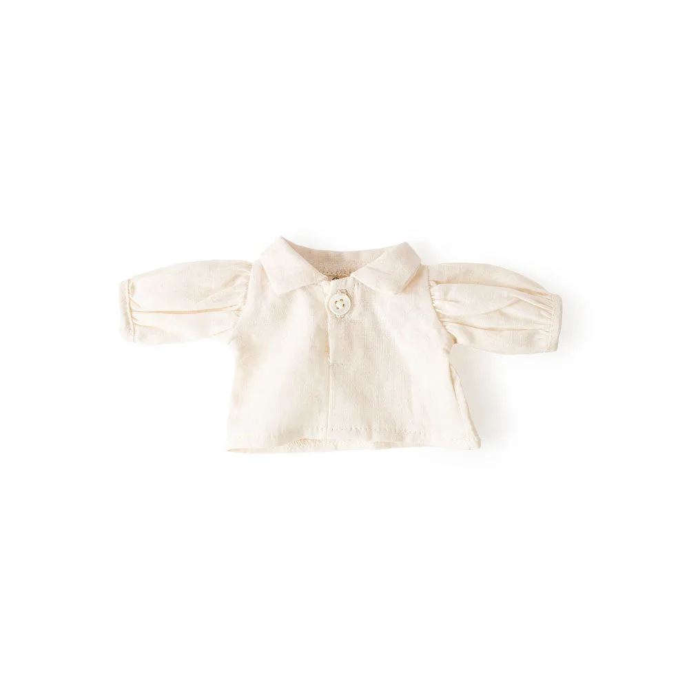 Cómo cuidar la blusa vaporosa y el chaleco nido de tu muñeca