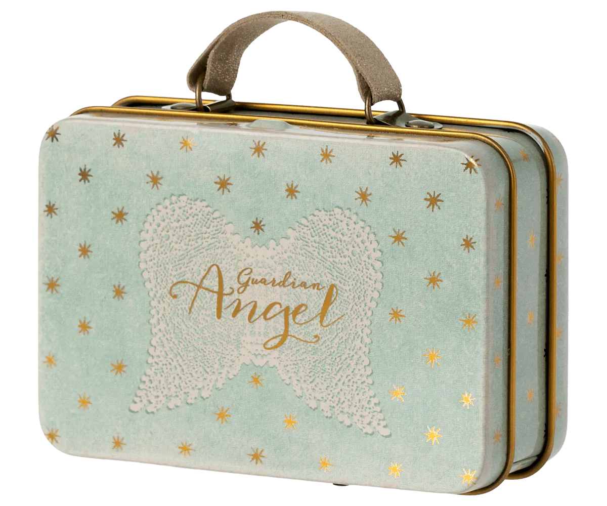 How to Style a Small Suitcase for Nursery Decor