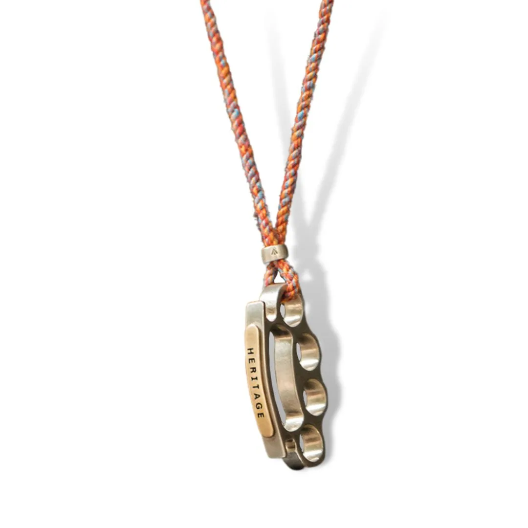 Collar de nudillos de latón tibetano vs. anillo de estrella de seis puntas