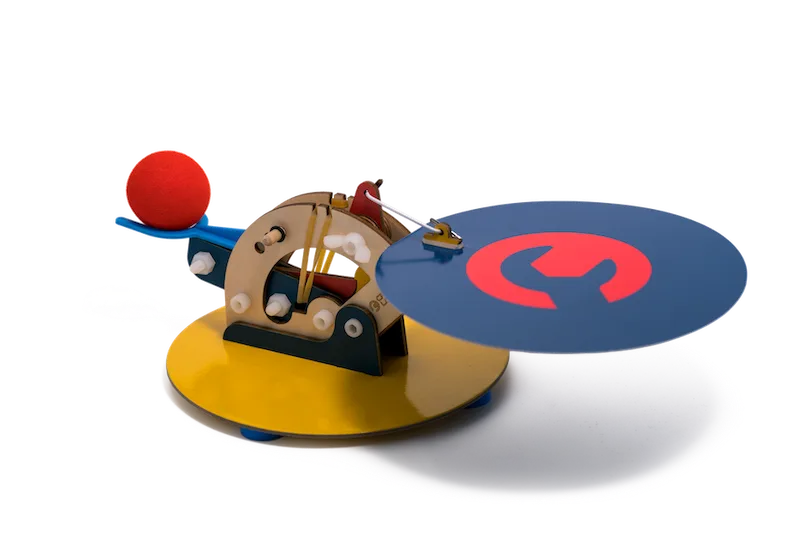 Why Your Domino Catapult Misses: Projectile Motion Fixes