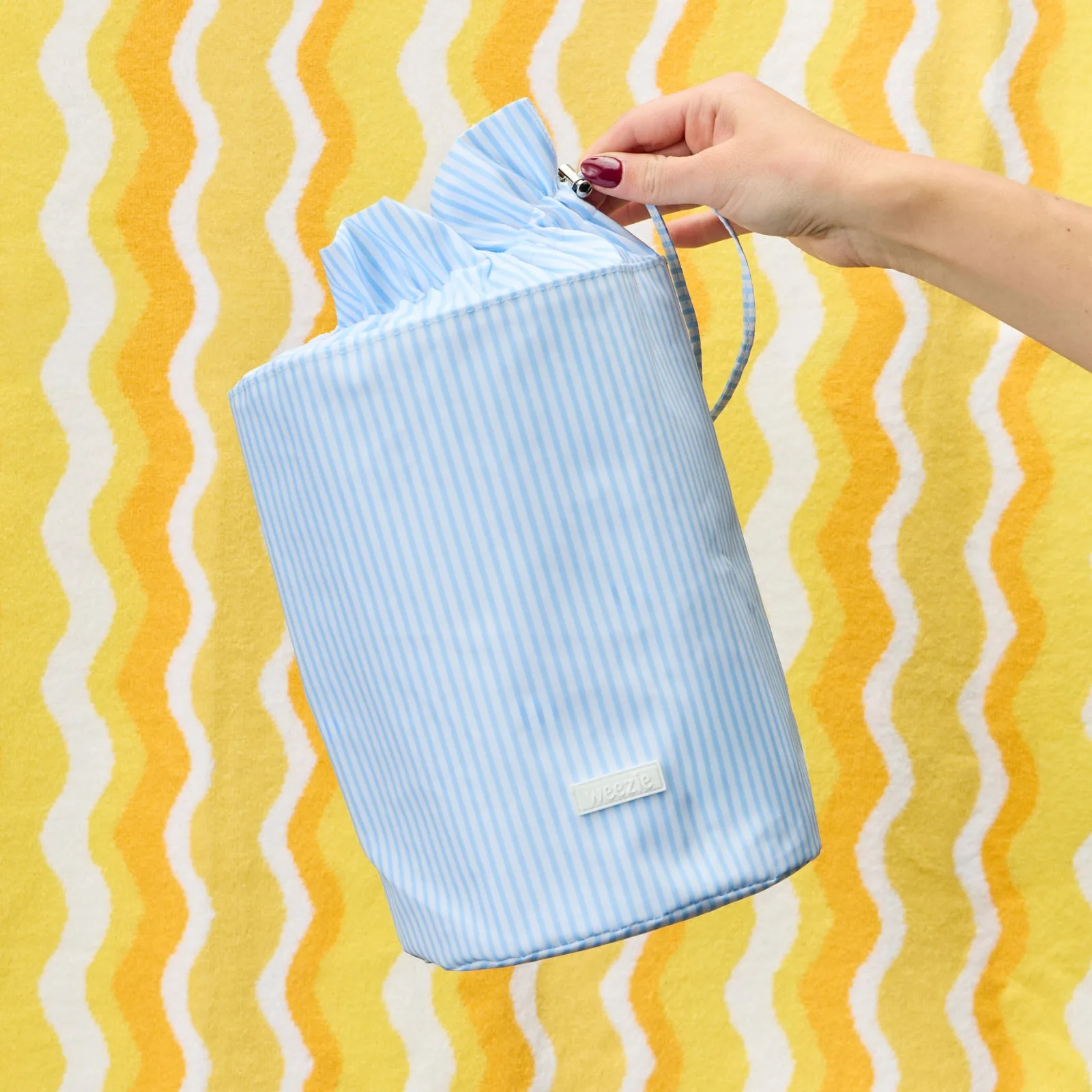 How to Pack a Beach Towel and Wet Bag Set for Pool Days