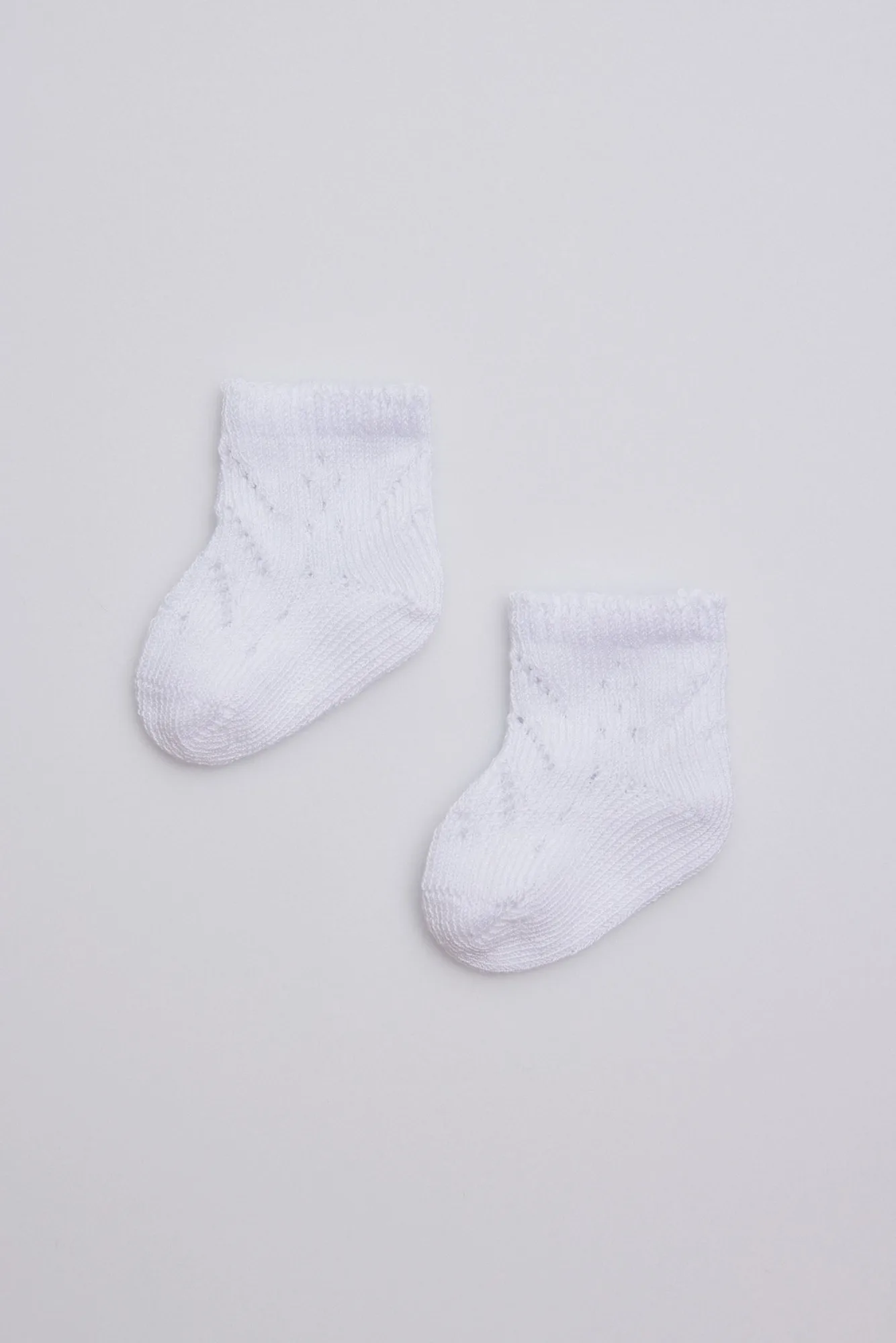 Calcetines perlé recién nacido blanco