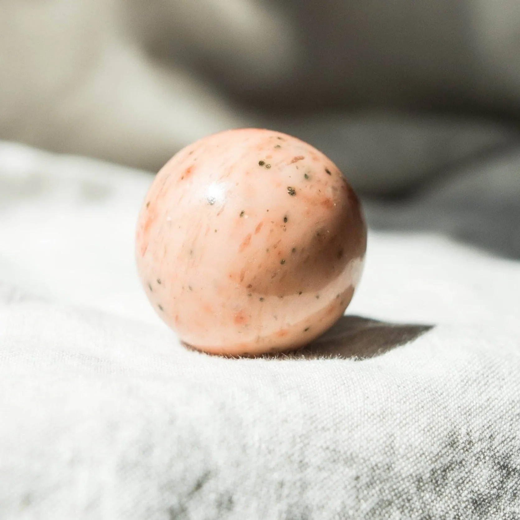 ORANGE CALCITE SPHERE WITH TRIPOD