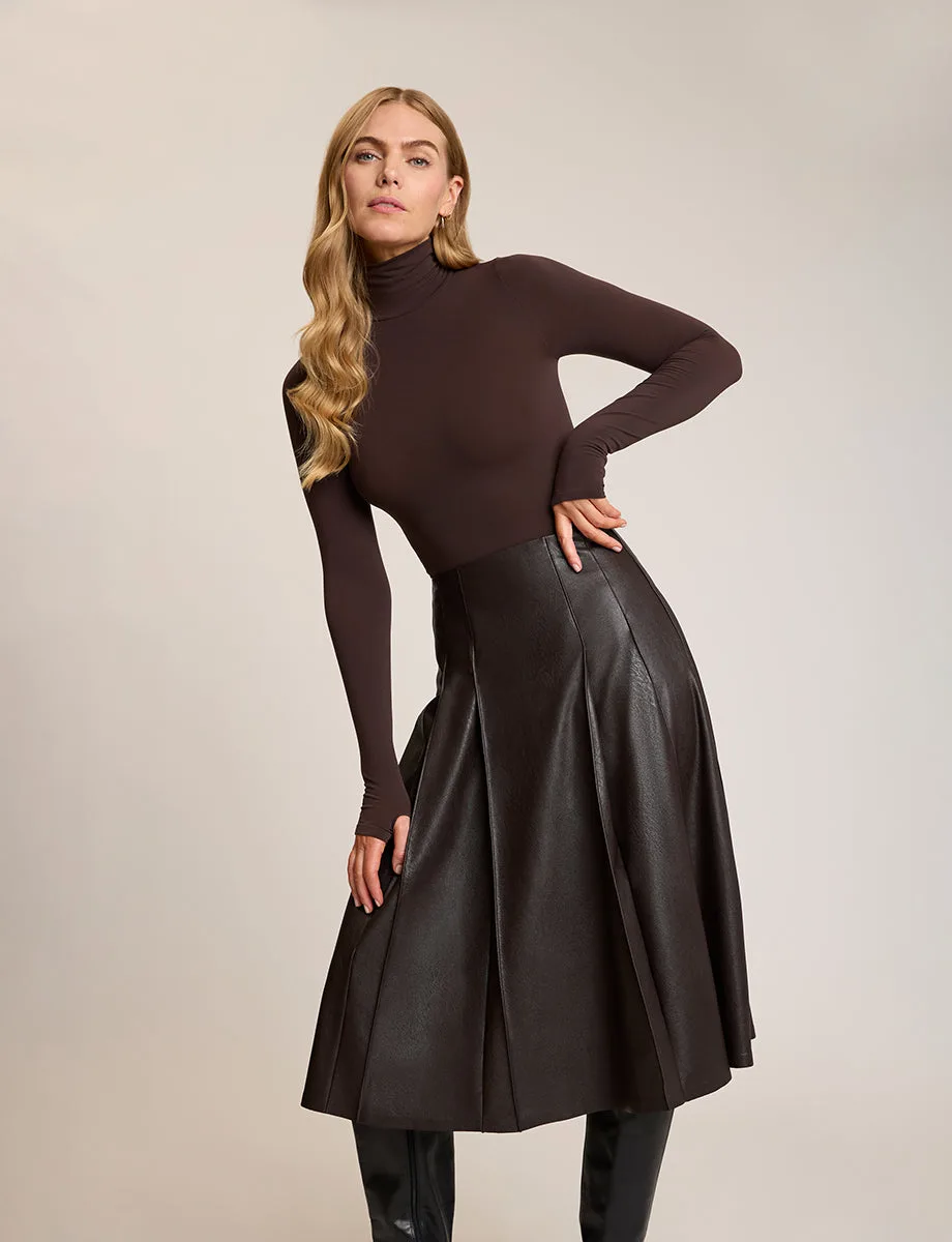 How to Style a Faux Leather Pleated Midi Skirt