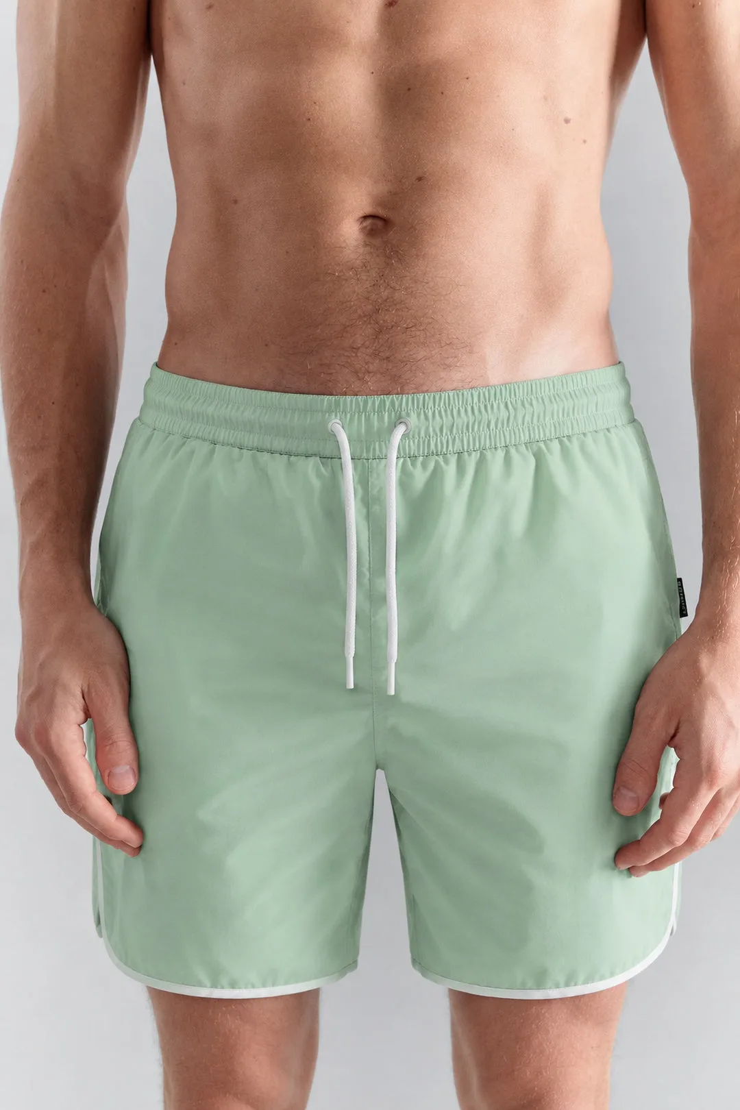 How to Match Swim Trunks with a Bikini Top