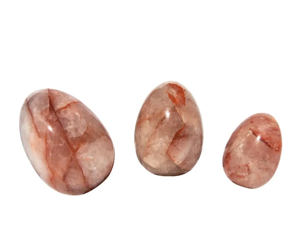 Œufs Yoni en Quartz Feu vs. Rhodonite : Lequel choisir ?