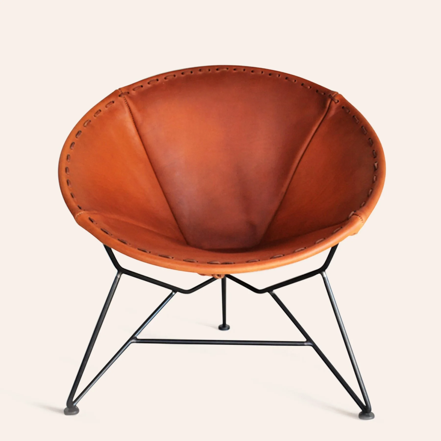 Sillón redondo de cuero
