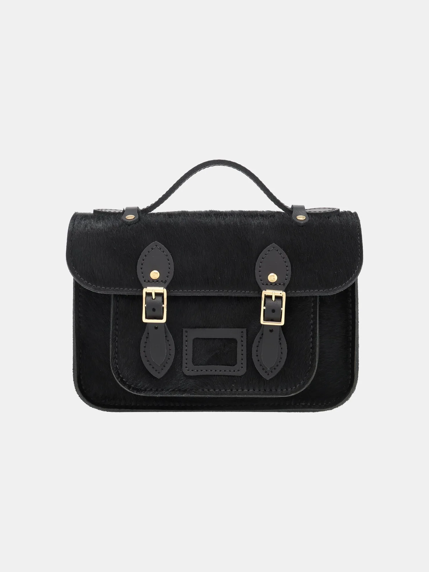 Verzorging van mini-satchels van haar-op-huid leer