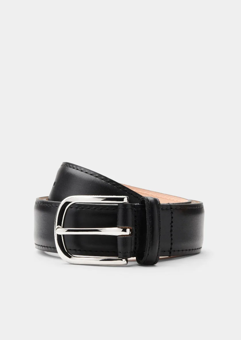 Associer une ceinture en cuir avec des boutons de manchette