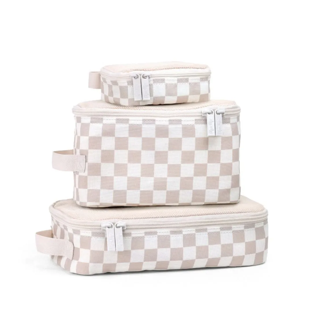 Cutie Coolers vs. Packing Cubes: Co lepiej organizuje?