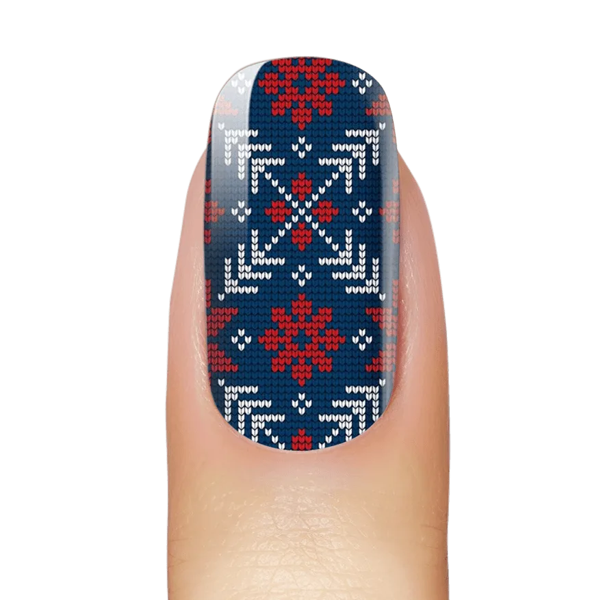 Gezellige kersttrui vs. poolschattigheid: nagelfolie-showdown