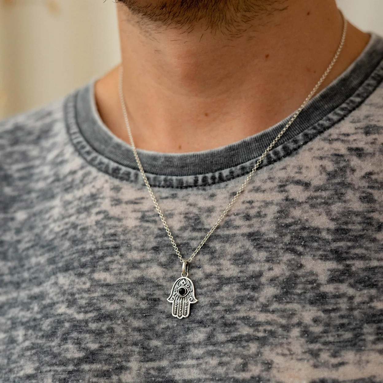 How to Style a Silver Hamsa Eye Pendant