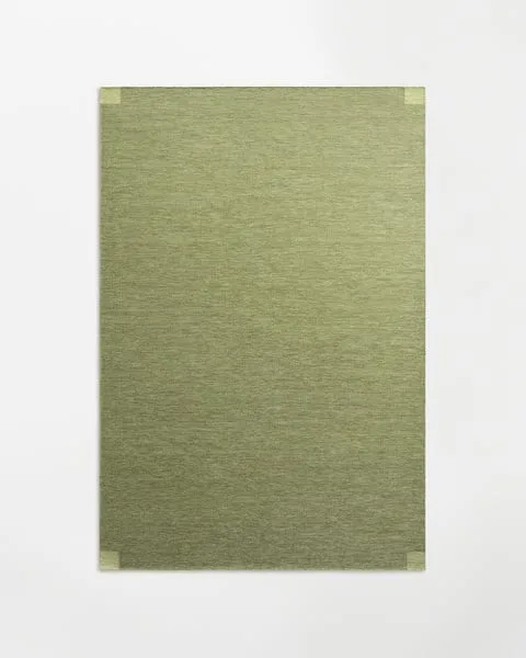 How to Style a Green Rug in a Neutral Living Room