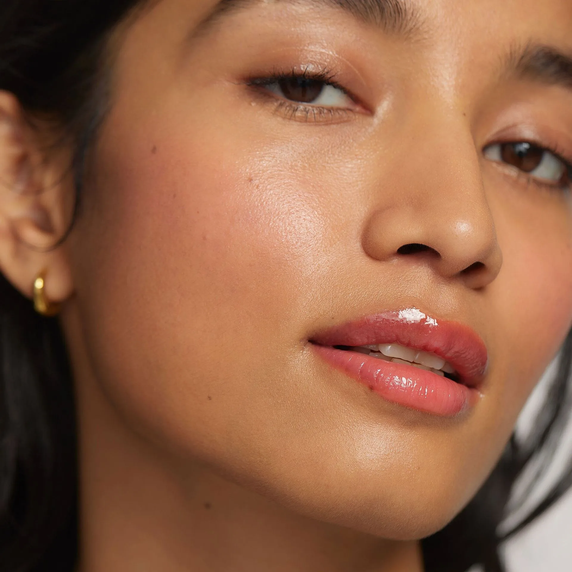 The Best Clean Beauty Lip Oils for Hydration and Shine