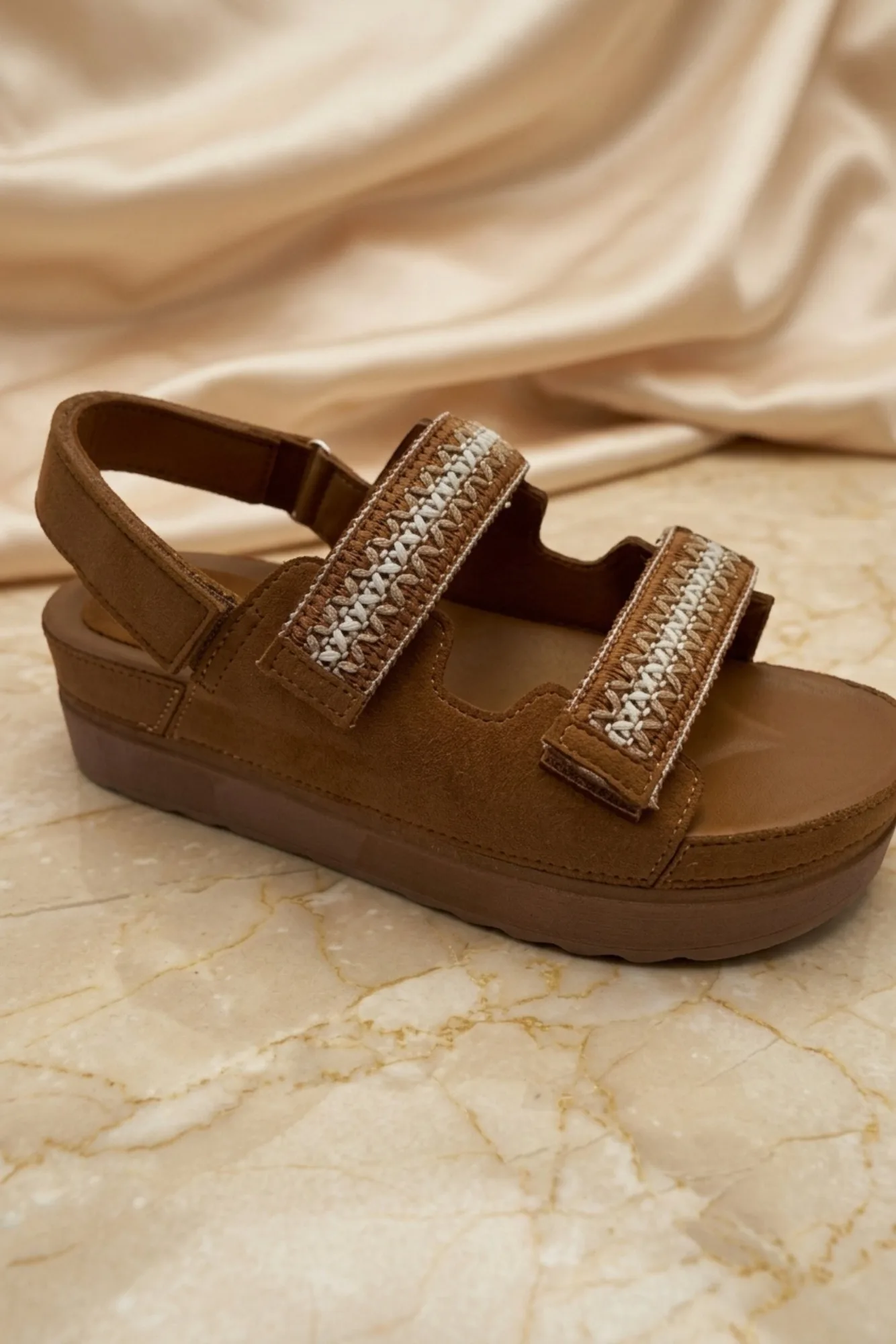 Gladiator-sandalen of blokhak-mules: wat koop je?