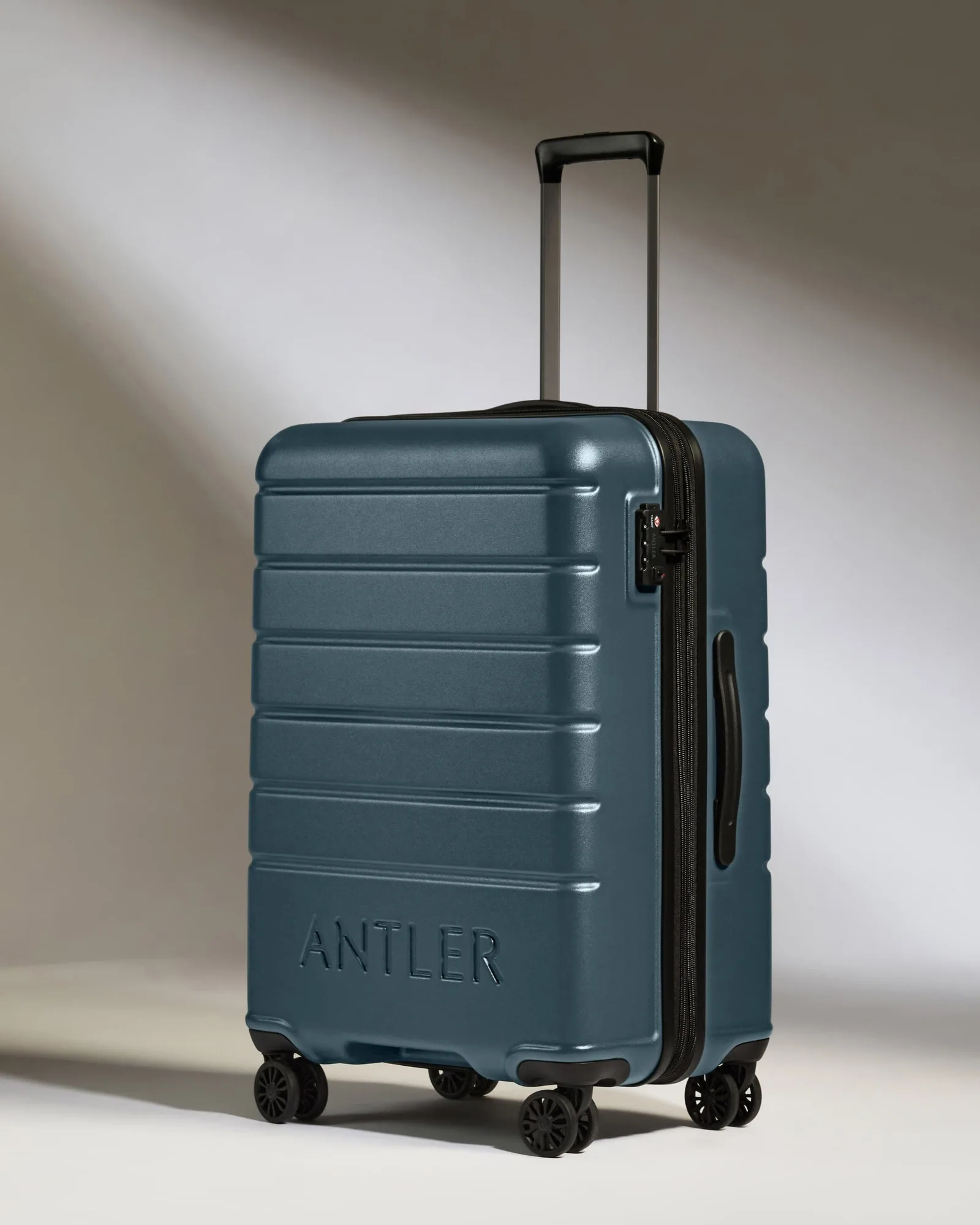 Bagage moyen gris bleu - Logo