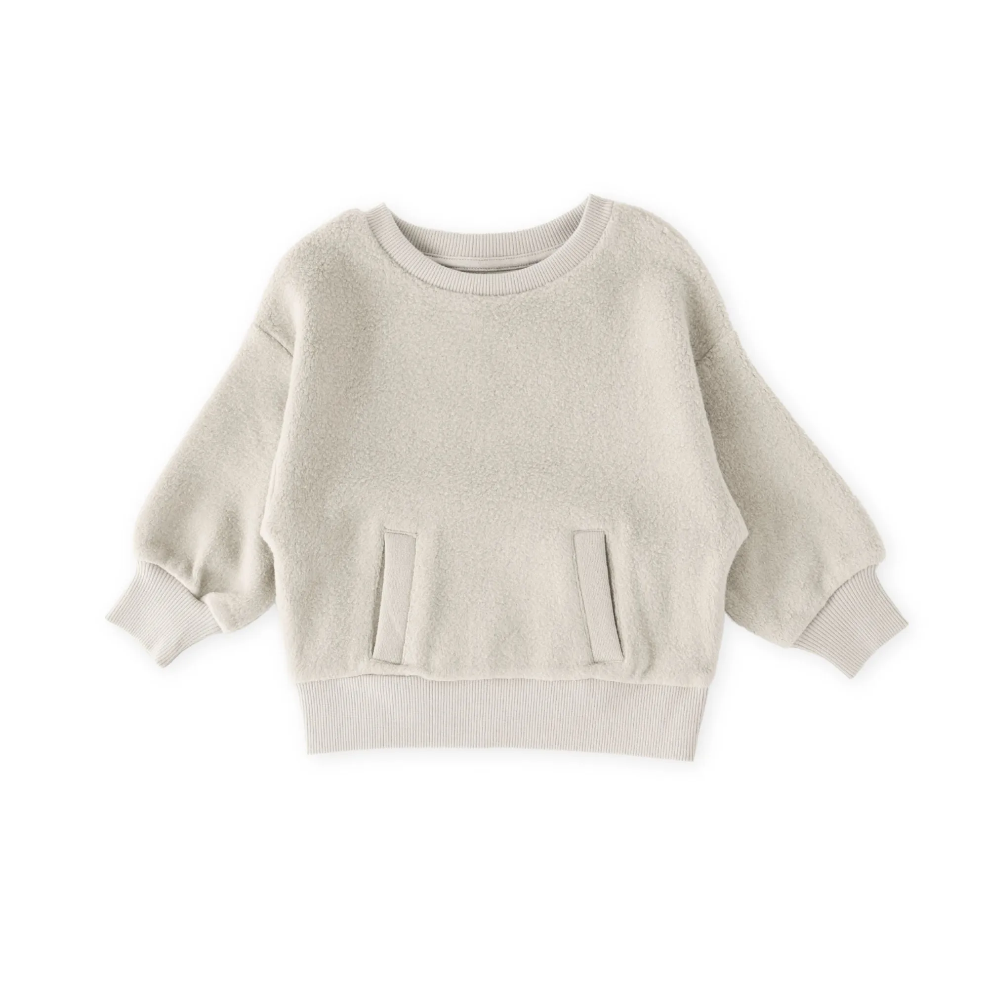 Come Vestire il Tuo Bambino per i Giorni di Pioggia: Cappotti e Accessori