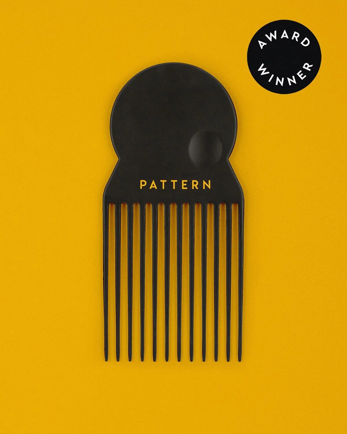 How to Use a Hair Pick for Defined Curls and Volume