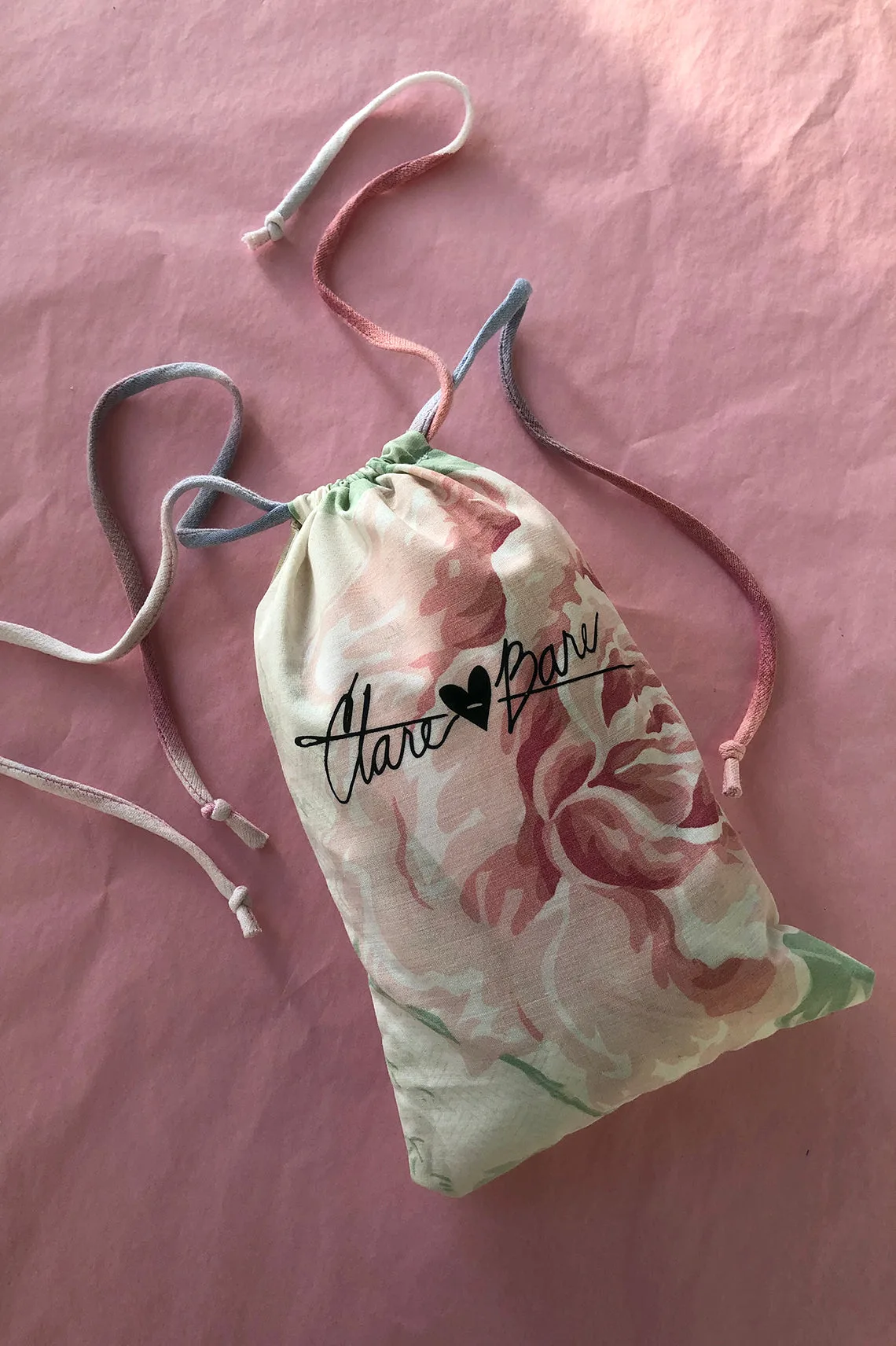 Bolso con cordón Clare Bare en estampado vintage reciclado