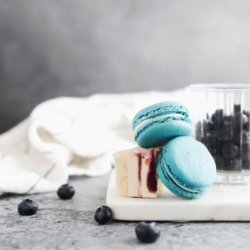 Macaron de tarta de queso y arándanos