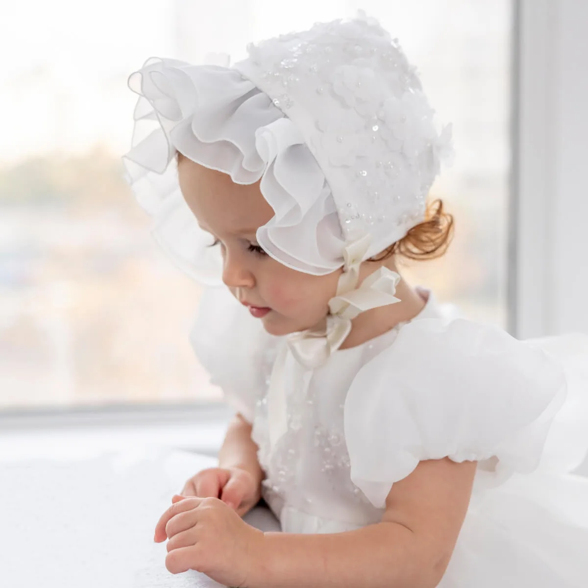 How to Choose a Baptism Bonnet for Your Baby