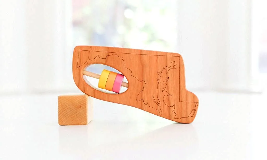 The Evolution of Wooden Baby Toys: From Heirlooms to Modern Montessori