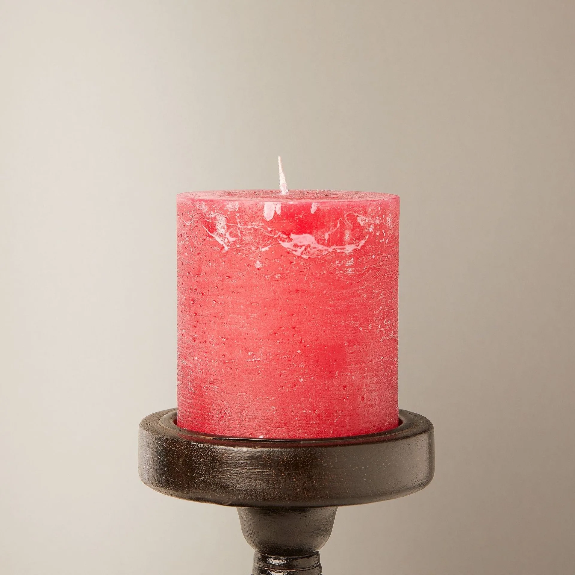 Larger Ferris pillar candle in warm red