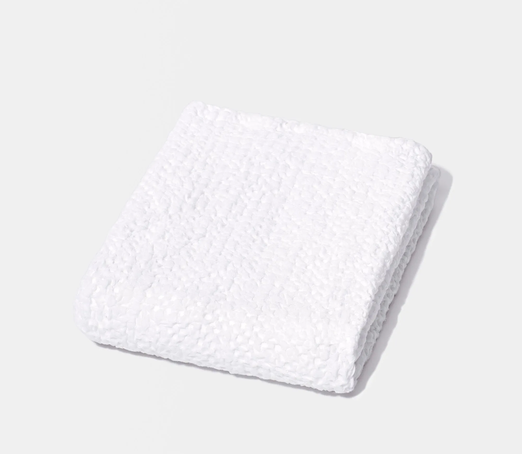 Manopla de baño con textura de panal