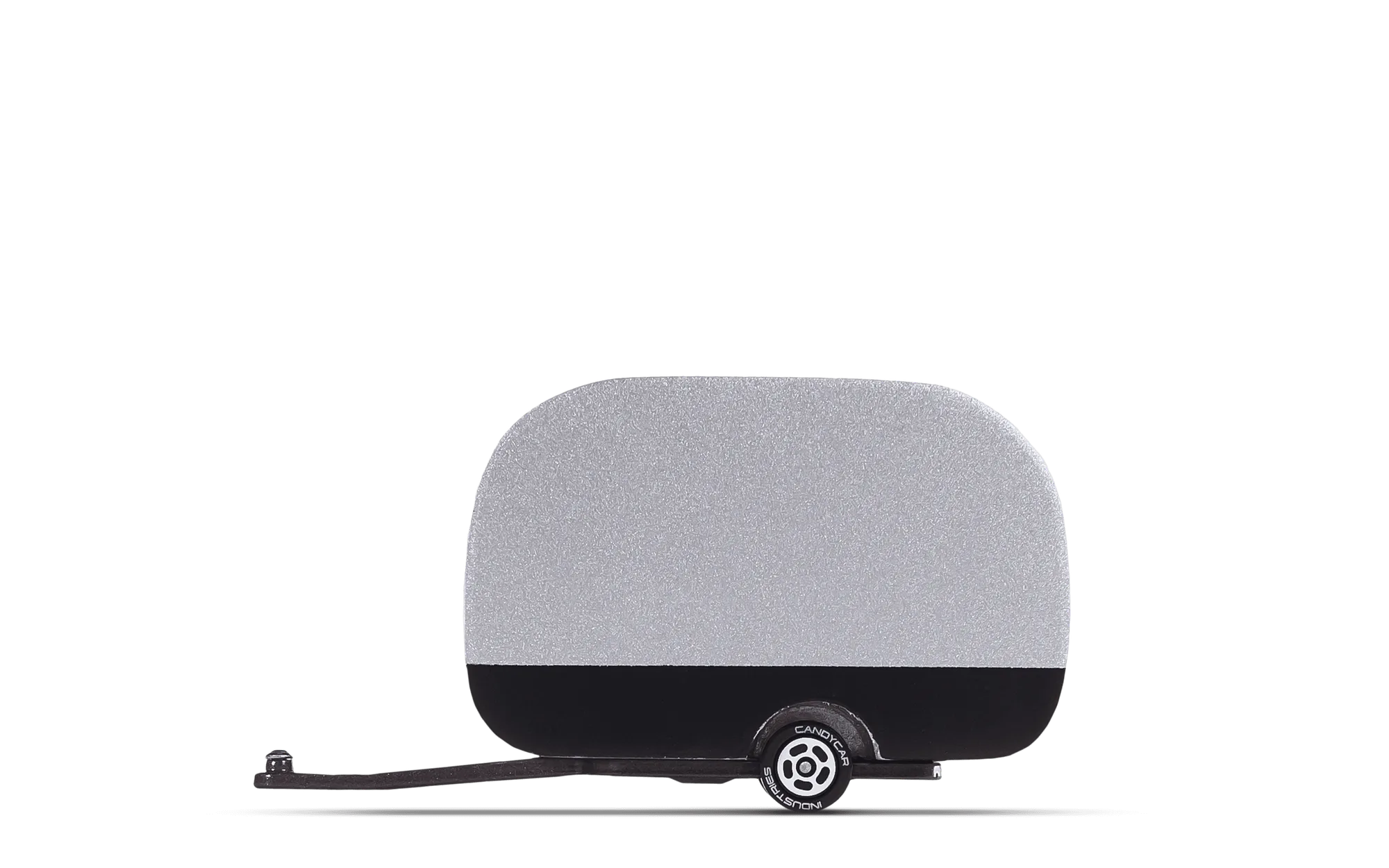 Setting Up a Toy Camper Scene with Airstream and Pinecone
