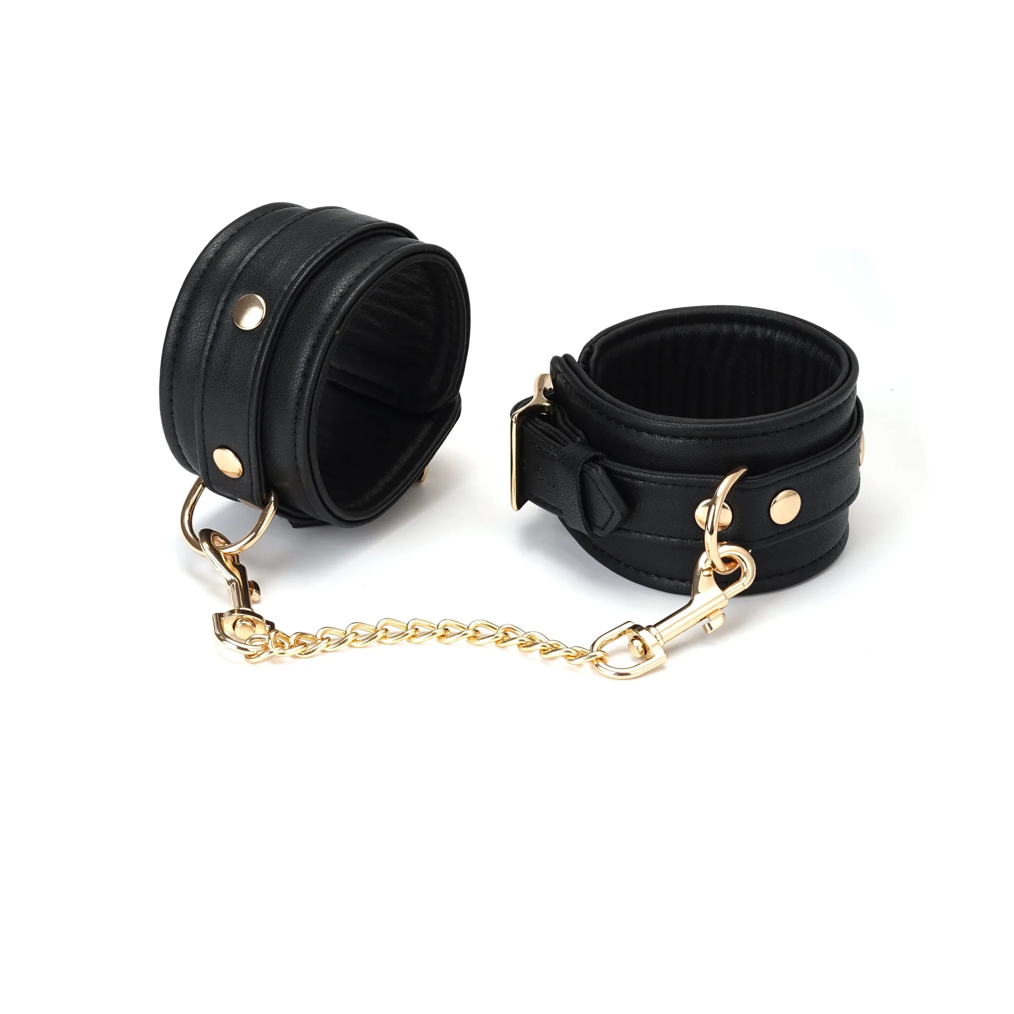 السر المظلم: أصفاد كاحل جلدية مع إكسسوارات ذهبية