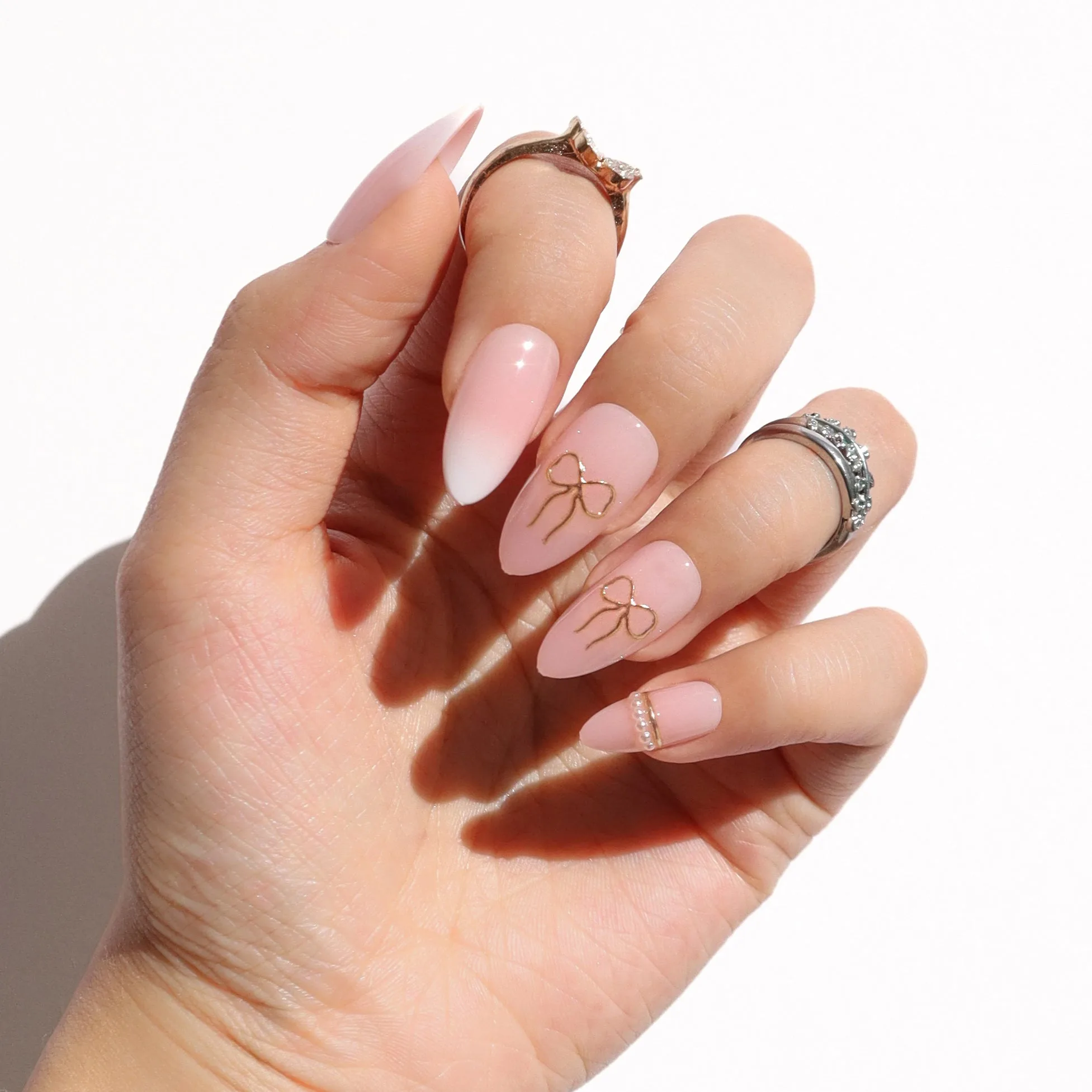 Golden Bow Press-On Nails: Metallic Gold Style Guide
