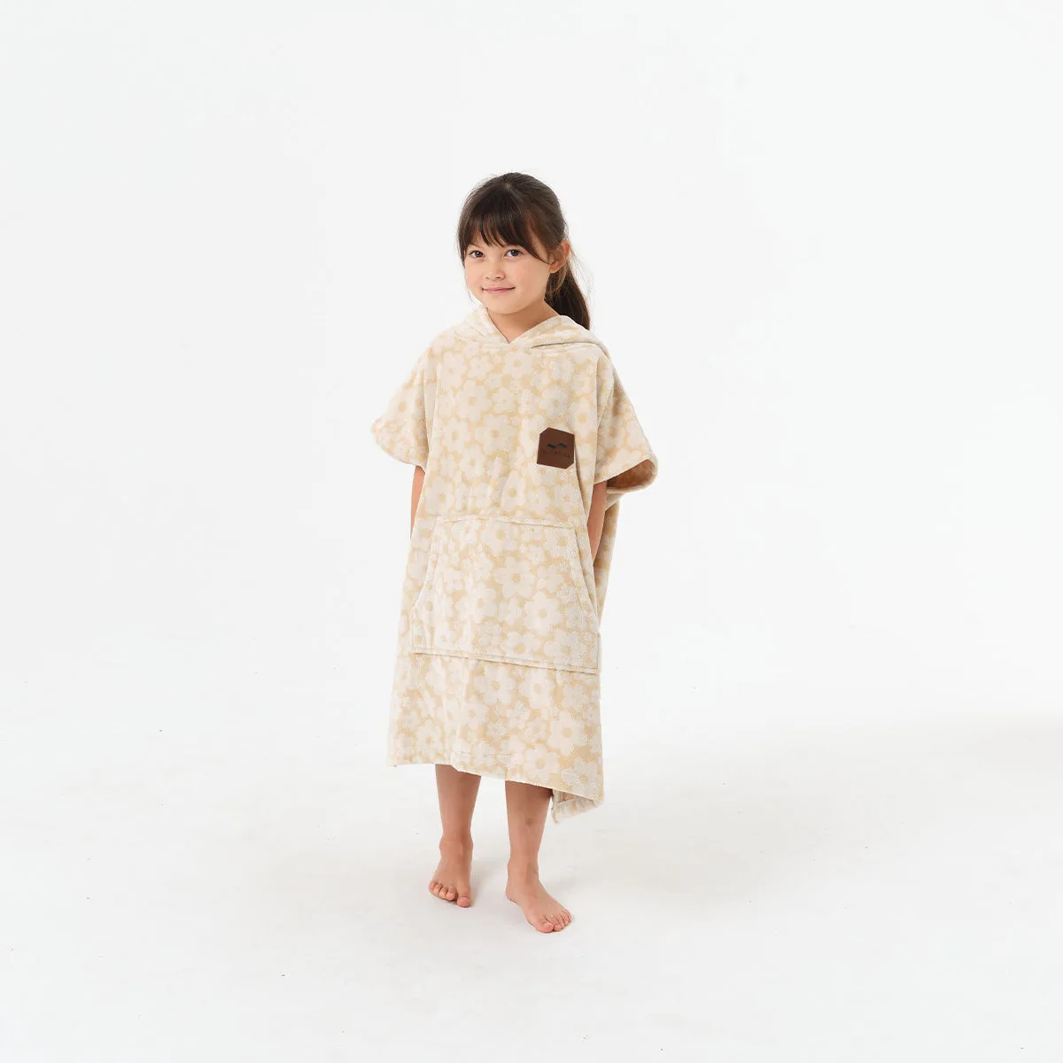 Poncho per bambini vs asciugamano: quale asciuga più velocemente dopo il nuoto?