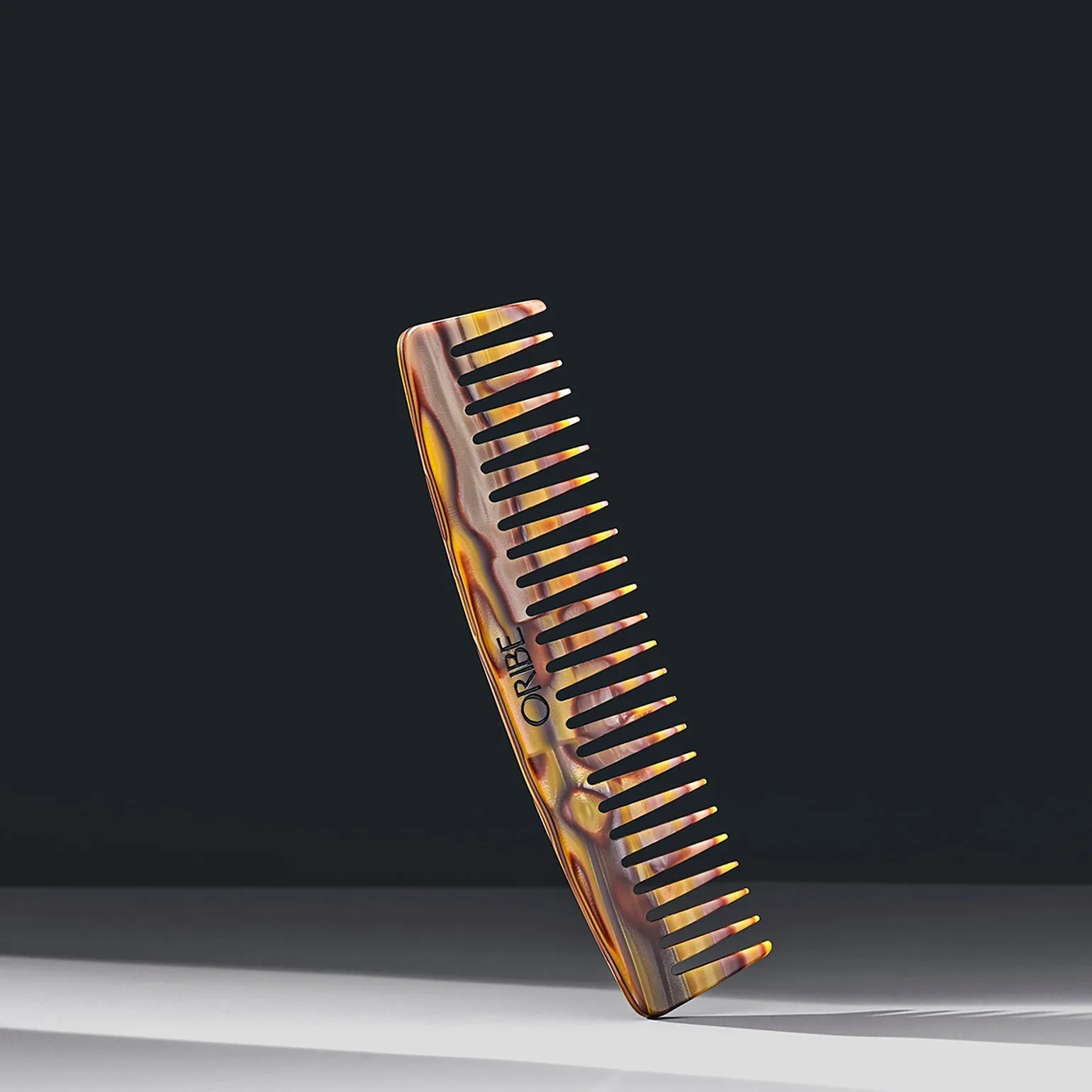 How to Clean and Care for Your Oribe Italian Resin Wide Tooth Comb