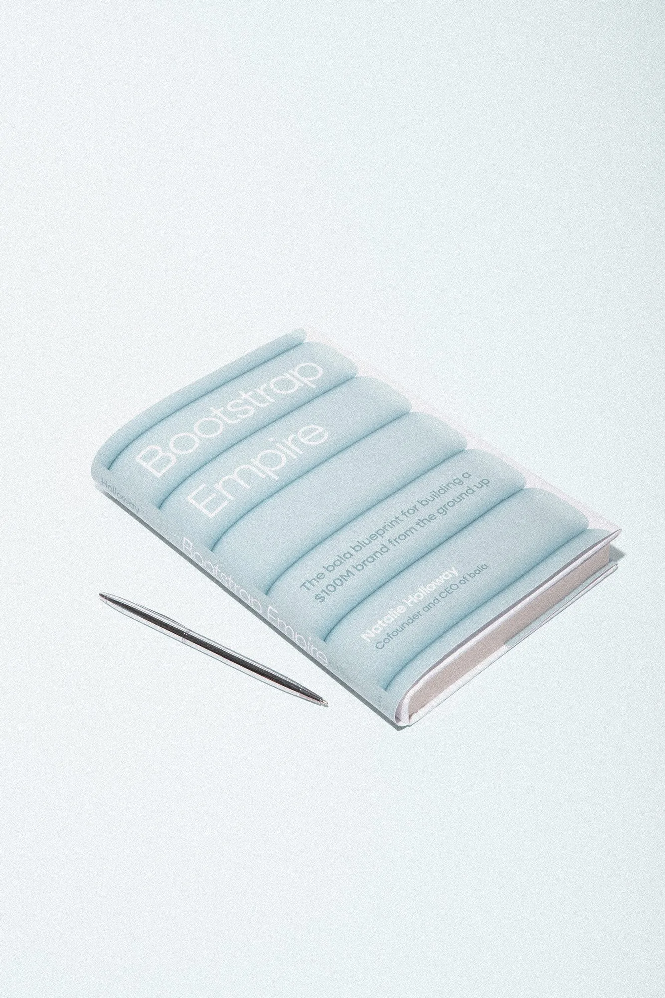 Bootstrap Empire Book vs. The Mat Strap: Which Accessory?