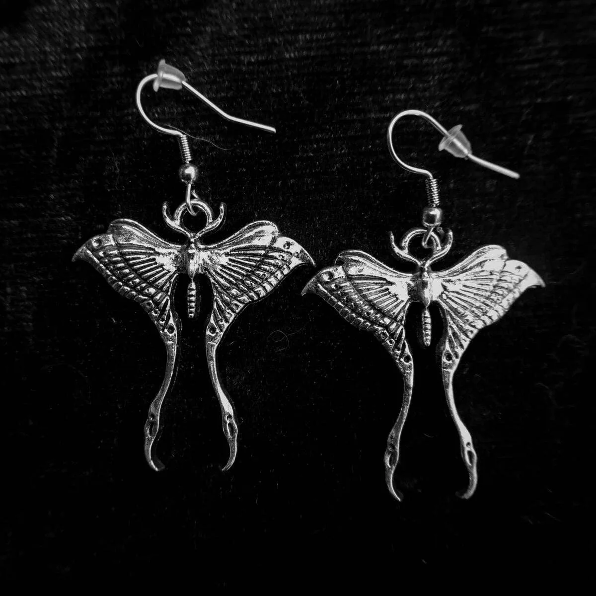 Pendientes Lunar Moth vs. Mini Holographic: ¿Cuál elegir?