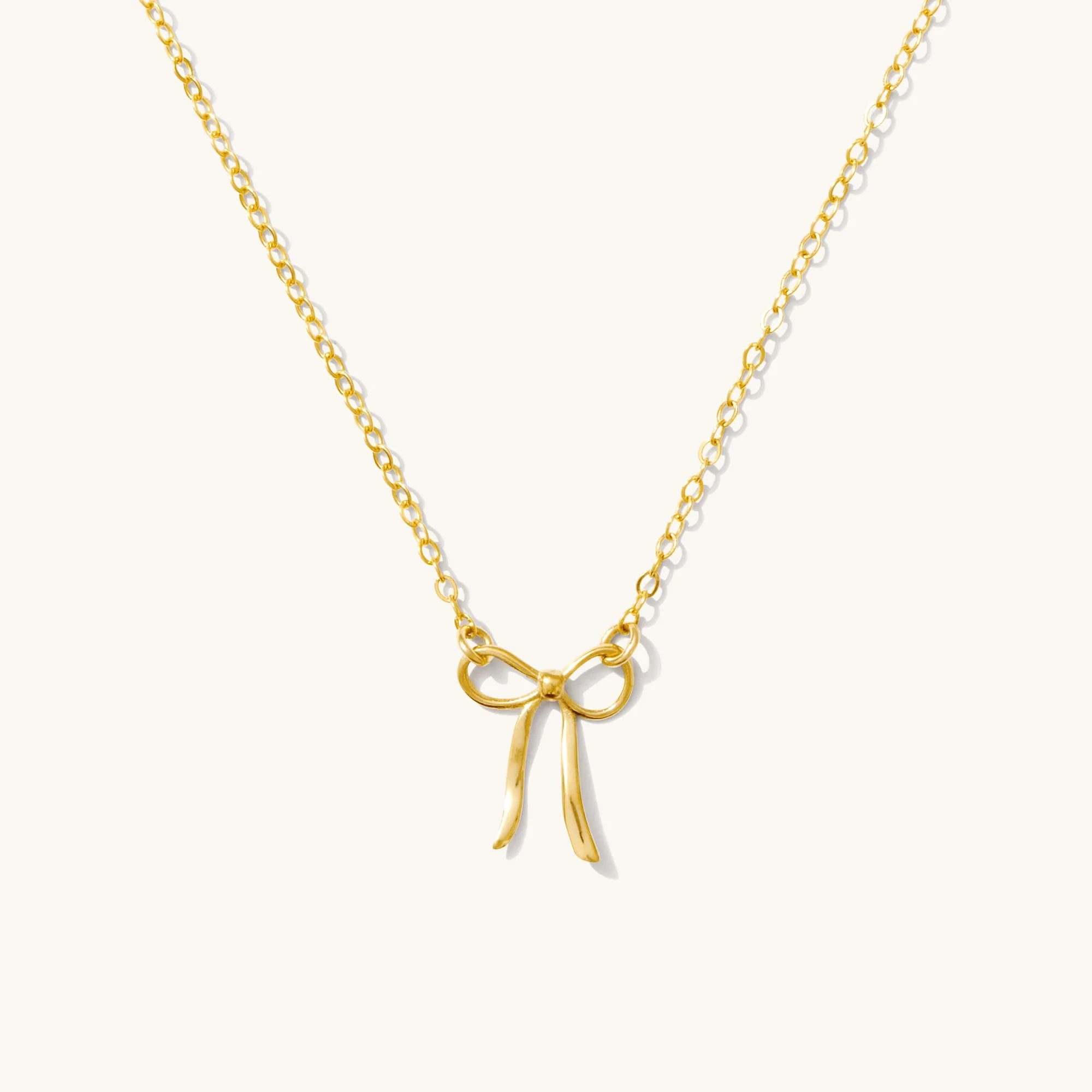 Dainty Bow Necklace vs Tiny Initial Necklace: Which Minimalist Pendant Suits You?