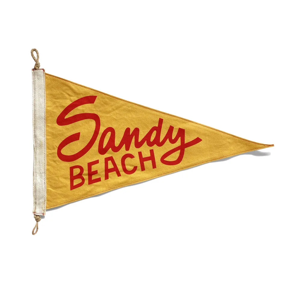 Cómo limpiar y guardar tu bandera de playa arenosa