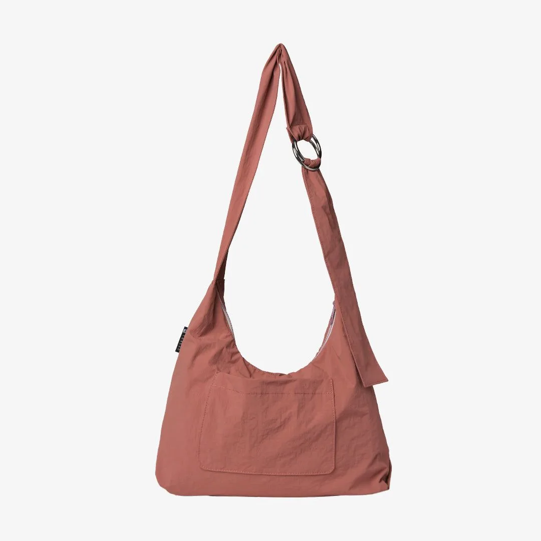 How to Choose the Perfect Water Bottle Sling Bag: Size, Material, and Features