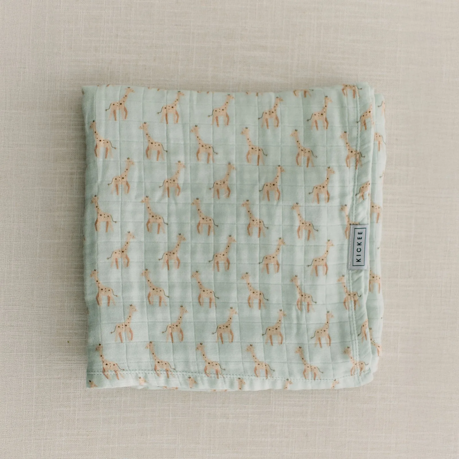Print Dreamy Soft Muslin Swaddling Blanket in Aloe Giraffe
