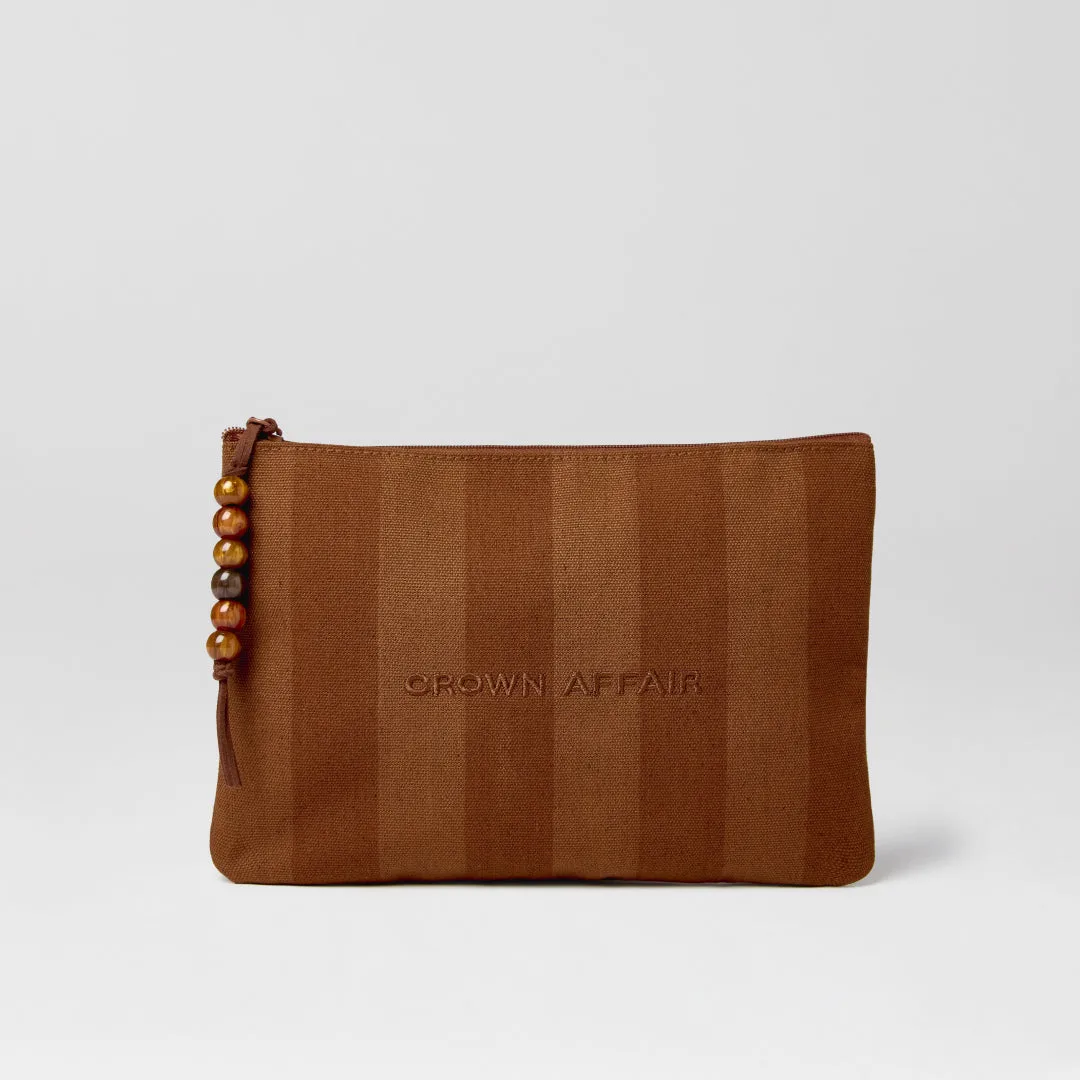 The Travel Pouch Review: The Ultimate Case for Organizing Your Crown Affair Collection