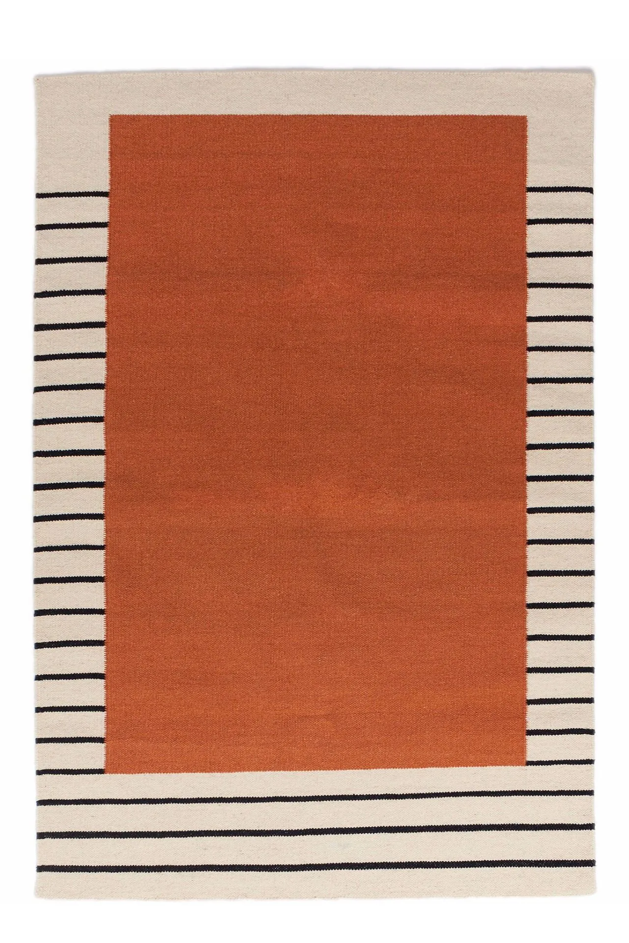 The Role of Rugs in Open Floor Plan Design: Zoning, Style & Comfort